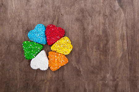 Marmalade is a sugar colored rainbow. Marmalade in the form of heart. Sweets on a wooden background. Marmalade Sweets  Clover. Eastern sweets.の写真素材