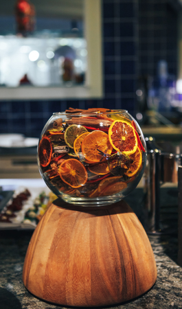 Dried citrus fruits in a glass bowl. Fruit chips.の写真素材