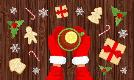 A cup of tea with a lemon in hands in red mittens and New Year's elements on a wooden background top view. The concept of winter New Year and Christmas comfort. Stock vector illustration.のイラスト素材
