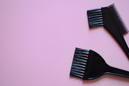 hairdressing brushes on pink background, hair coloring brushes, beauty salon banner, pink backgroundの写真素材