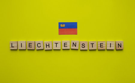 August 15, Liechtenstein Day independence, Liechtenstein national Day, Liechtenstein flag, minimalistic banner with wooden lettersの写真素材