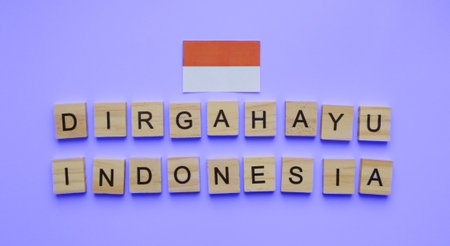 August 17, Indonesia Independence Day, flag of Indonesia, minimalistic banner with the inscription in wooden letters Dirgahayu Indonesiaの写真素材