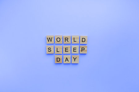 On March 17, World Sleep Day, a minimalistic banner with an inscription in wooden lettersの写真素材