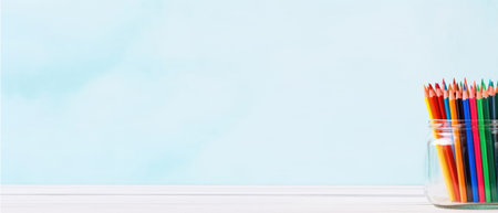 horizontal banner, stationery, glass with colored pencils, artists day, knowledge day, place for textの素材