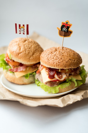 Bacon burgers with bbq sauceの写真素材