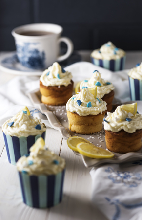 Lemon ricotta cupcakes with coconut creamの写真素材