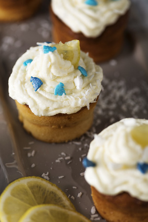 Lemon ricotta cupcakes with coconut creamの写真素材