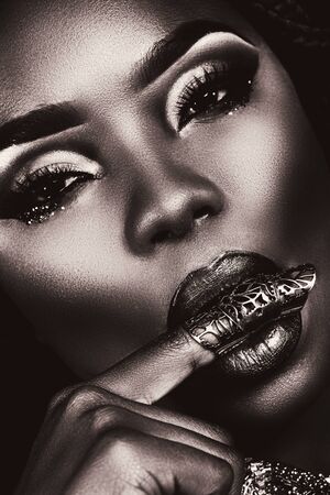 Portrait of African American with massive ornamentsの写真素材