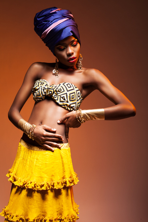 Dance hot African night, a beautiful woman in a bright dressの写真素材