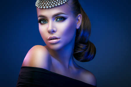 exquisite and beautiful lady in an evening make-upの写真素材