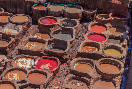 Tannery tanks in Fes, Morocco, filled with dying solution for leather