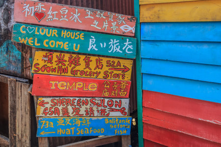 Georgetown Penang Malaysia  August 23 2013: Colorful sign at Chew Jetty small village built on water by the Chinese Chew clan in the 19th century as they could not get land in the UNESCO heritage zoneのeditorial素材
