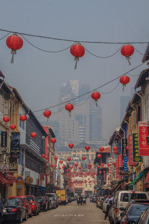Singapore, Singapore - June 16, 2013: Famous Chinatown in Singapore with colonial houses. Smog in the air is caused by the burning of palm plantations in Indonesiaのeditorial素材