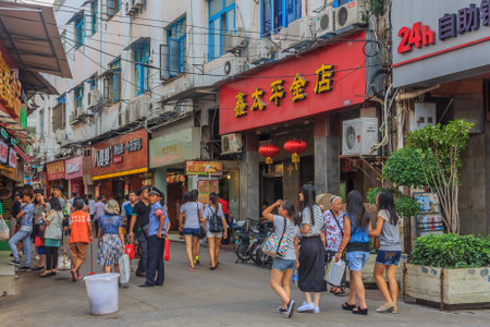 September 14, 2013 -Xiamen, China: Busy shopping street in center of the cityのeditorial素材