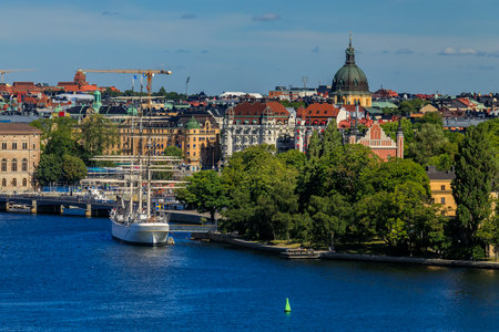 Stockholm, Sweden - August 11, 2017: View onto Stockholm old town and a tall ship on Lake Mälaren in Swedenのeditorial素材