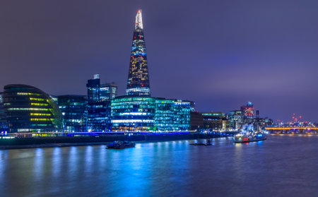 City skyline at sunset with the Shard on Thames river by Tower Bridge in London, England at twilightのeditorial素材
