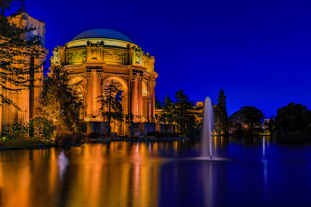 Panorama with the iluminated Palace of Fine Arts during the blue hour at sunset in San Francisco, California photographed in HDRのeditorial素材