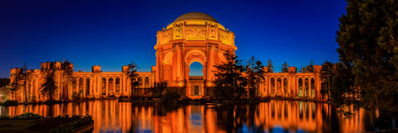 Panorama with the iluminated Palace of Fine Arts during the blue hour at sunset in San Francisco, California photographed in HDRのeditorial素材