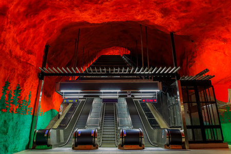 Stockholm underground metro or tunnelbana station Solna Centrum with fire like wall designsのeditorial素材
