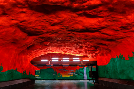 Stockholm underground metro or tunnelbana station Solna Centrum with fire like wall designsのeditorial素材