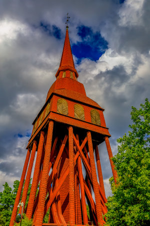Stockholm, Sweden - August 20, 2017: Preserved traditional swedish old wooden Hallestad Belfry from the 18th century in Skansen village, open air museumのeditorial素材