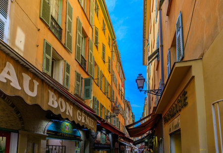 Nice, France - May 24, 2018: View of traditional stores and cafes in mediterranean houses in the streets Old Townのeditorial素材