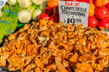 Fresh wild chanterelle mushrooms for sale at Pike Place Market in Seattle, Washingtonの写真素材
