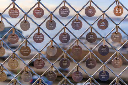 Seattle, United States - November 08, 2018: Market Charms, symbolic locks on the fence of the waterfront terrace at the Pike Place Market, facing Puget Soundのeditorial素材
