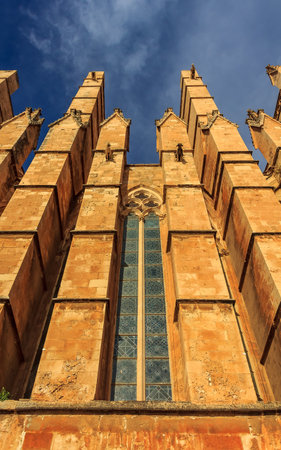 Details of the facade with gargoyles on Cathedral of Santa Maria of Palma (Cathedral of St. Mary of Palma) or La Seu, a Gothic Roman Catholic cathedral in Palma de Mallorca in Mallorca on Balearic islands in Spainのeditorial素材