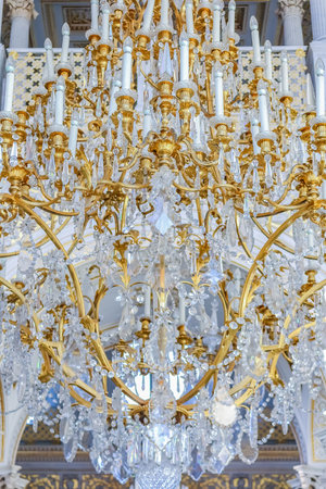 Saint Petersburg, Russia - October 4, 2015: Ornate chandelier on the ceiling of the State Hermitage ...
