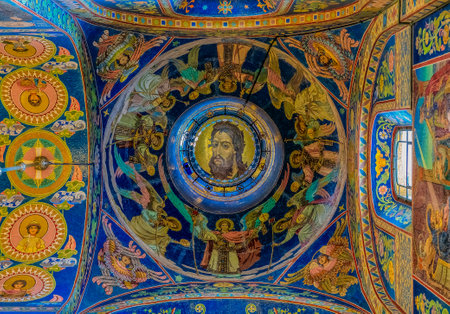 Saint Petersburg, Russia - September 9, 2017: Ornate interior and colorful mosaic icons of Jesus Christ on the ceiling of Church of the Savior on Spilled Blood or Cathedral of Resurrection of Christのeditorial素材