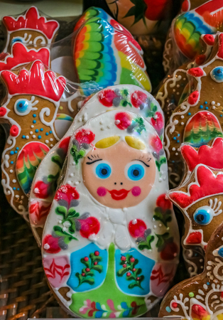 Ornate pryaniki, Russian honey spice cookies, shaped like matryoshka dolls on display at a grocery store  in Saint Petersburg, Russiaの写真素材