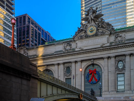 New York, USA - December 07, 2018: Christmas decorations red ribbon and wreath on the iconic Grand Central Terminal in Manhattanのeditorial素材