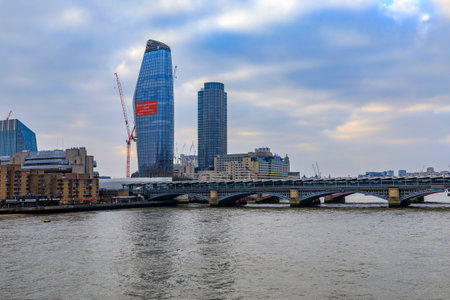 London, England - January 14, 2018: City skyline with One Blackfriars residential skyscraper and Blackfriars Bridge across Thames river during the dayのeditorial素材