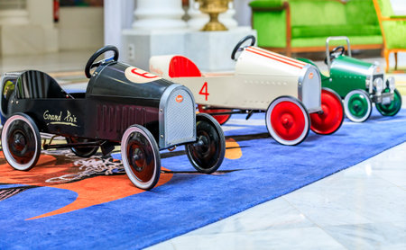 Nice France - May 27, 2017: Extravagant ornate decor of the Grand Salon Royal Lounge with collectible toy cars on display in the luxury Negresco hotelのeditorial素材
