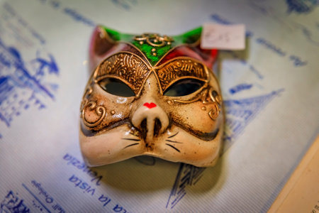 Venice, Italy - September 24, 2017: Traditional ornate Venetian carnival cat mask on display at a craftsman workshop studio and storeのeditorial素材