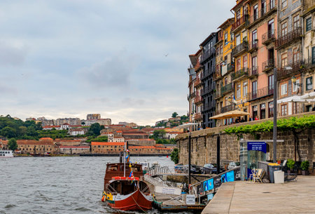 Porto, Portugal - May 30, 2018: Facades of traditional houses with azulejo tile in Ribeira and...