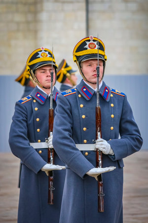 Moscow, Russia - October 10, 2015: Presidential Guards saluting with rifles at changing of the...
