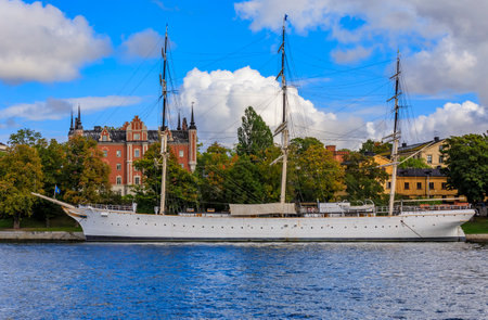Stockholm, Sweden - September 17, 2017: Admiralty House and full-rigged ship, youth hostel af Chapman, built in 1888, moored on Skeppsholmen isletのeditorial素材
