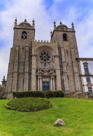 Facade of Porto Cathedral of Assumption of Our Lady or Se Catedral do Porto, built in 12th century and located in center of old town Porto, Portugalの写真素材