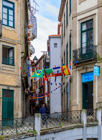 Porto, Portugal - May 29 2018: Tourist Information office among shabby facades of traditional Portuguese houses in disrepair in streets of old townのeditorial素材