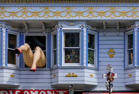 San Francisco, USA - July 04, 2019: Iconic sculpture with female legs in fishnet stockings and red heels in a window in Haight Ashbury neighborhoodのeditorial素材