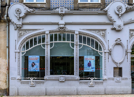 Porto Portugal - May 30, 2018: Floral details on a facade of a traditional art nouveau house trimmed with ornate Portuguese azulejo tilesのeditorial素材