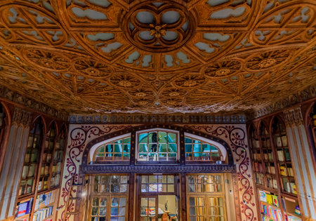 Porto, Portugal - May 30, 2018: Livraria Lello and Irmao bookshop in Porto in a neo-gothic building from 1906 exquisitely decorated with wood panelingのeditorial素材