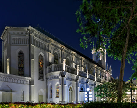 Singapore - September 11, 2019: Gothic chapel of CHIJMES, an old catholic convent converted into a shopping, dining and events center, after sunsetのeditorial素材