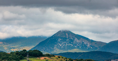 Landscape with a view of a valley and the Pyrenees mountains in the suburbs of Pamplona, Navarre,...