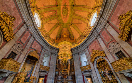 Porto Portugal - May 30, 2018: View of the ornate baroque interior with a marble altarpiece of the Igreja dos Clerigos church in old town, a symbol of Portoのeditorial素材