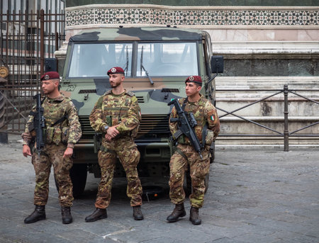 Florence, Italy - June 03, 2022: Carabinieri officers stand next to a police vehicles by the Duomo Cathedral or Cattedrale di Santa Maria del Fioreのeditorial素材