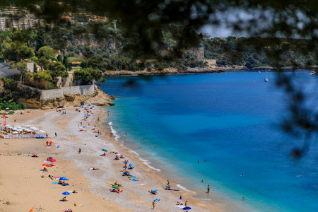 View onto the turquoise water of the Mediterranean Sea and coastline in Roquebrune Cap Martin, South of France near Monacoの写真素材