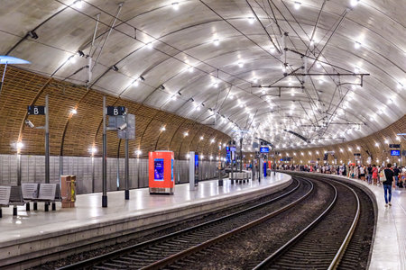 Monte Carlo, Monaco - May 27, 2022: Train tracks disappearing into the tunnel and lights at the underground train station in Cote d Azurのeditorial素材
